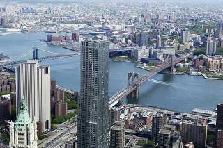 The Brooklyn Bridge and Manhattan Bridge is seen from the 90th story of One World Trade Center in New York