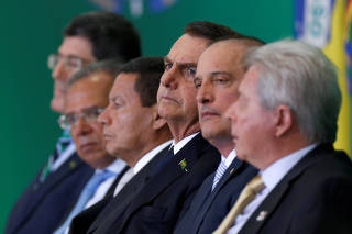 FILE PHOTO: Levy, Guedes, Mourao, Bolsonaro, Lorenzoni and Novaes attend ceremony at Planalto Palace in Brasilia