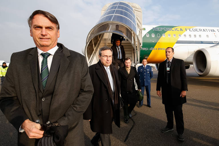 Bolsonaro durante chegada à Suíça para participar do Fórum Econômico Mundial, em Davos. É a primeira viagem internacional do presidente