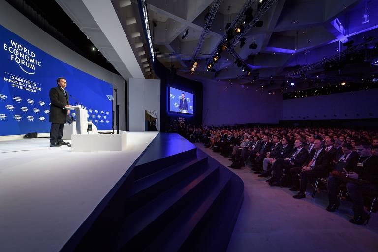 O presidente Jair Bolsonaro fala a plateia de empresários em Davos