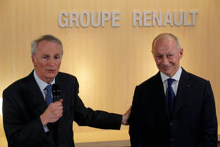 Jean-Dominique Senard, newly-appointed Chairman of Renault, and Thierry Bollore, newly-appointed CEO of Renault, talk to journalists after French carmaker Renault's board of directors meeting in Boulogne-Billancourt, near Paris