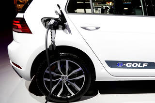 FILE PHOTO: A Volkswagen e-Golf electric car is pictured at Brussels Motor Show