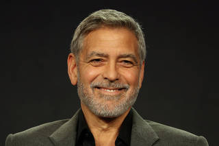 Actor, executive producer, and director George Clooney speaks on a panel for the Hulu series 