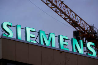 Logo of German industrial group Siemens is seen in Zurich