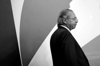 Brazil's Economy Minister Paulo Guedes attends an event in Brasilia