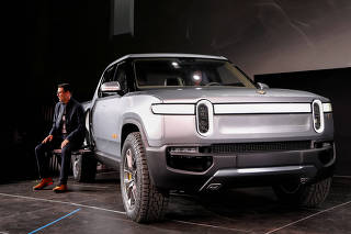 FILE PHOTO: Rivian introduces R1T all-electric pickup truck at LA Auto Show in Los Angeles