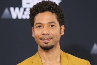 FILE PHOTO: Jussie Smollett poses in the photo room at the 2017 BET Awards in Los Angeles