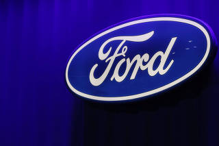 FILE PHOTO: Ford logo is seen at the North American International Auto Show in Detroit, Michigan