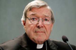 FILE PHOTO: Cardinal George Pell attends news conference at the Vatican