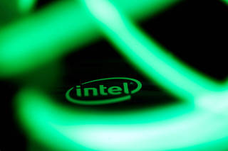 FILE PHOTO: Intel logo is seen behind LED lights in this illustration