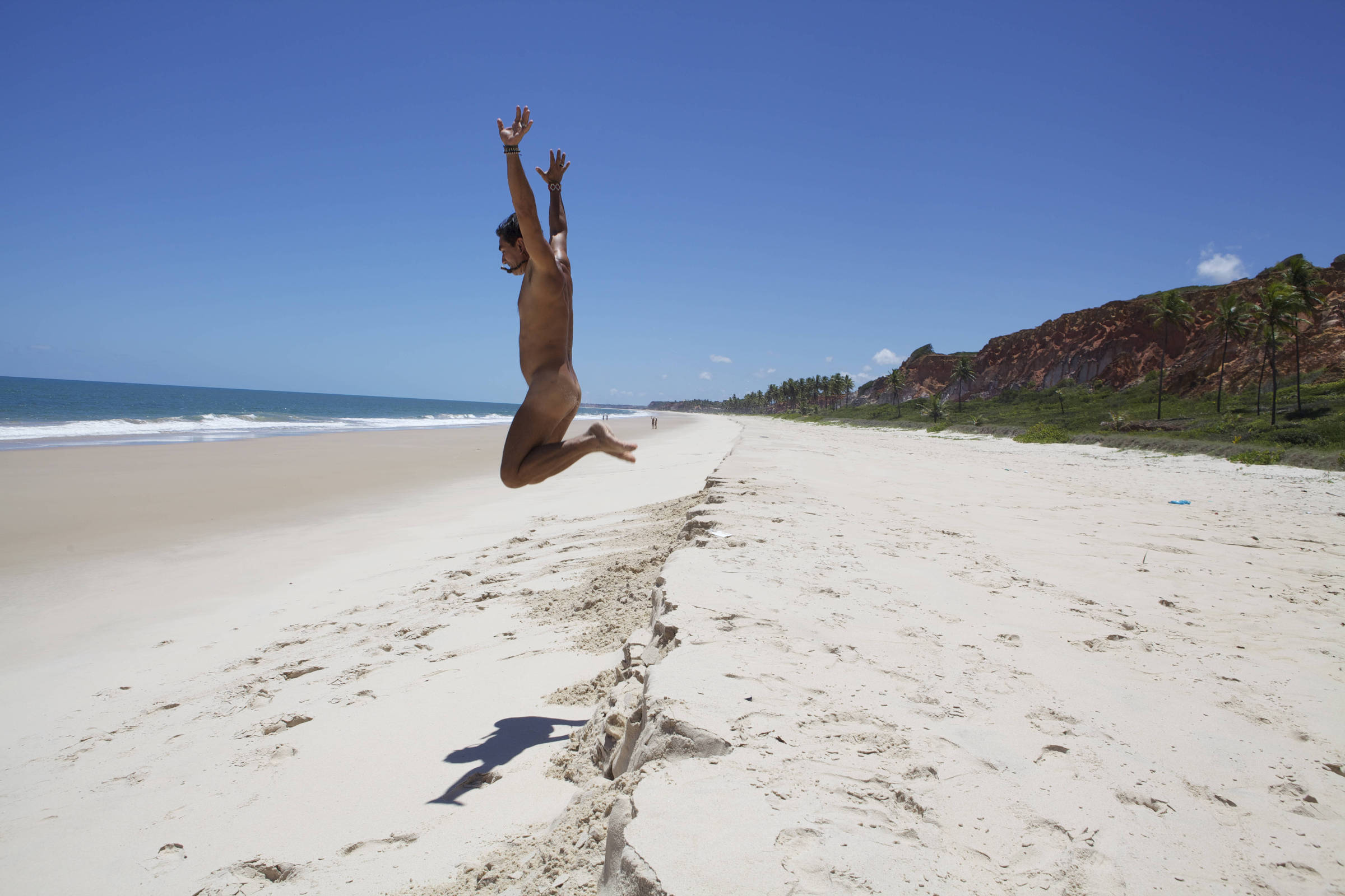 Familias peladas na praia