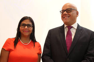 President of Venezuela's National Constituent Assembly Delcy Rodriguez and her brother Mayor of Caracas Jorge Rodriguez talk to the media in Santo Domingo