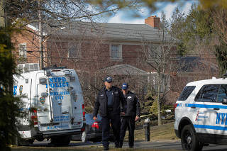 NYPD officers investigate the scene where reported New York Mafia Gambino family crime boss was killed, in New York