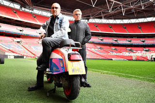 Roger Daltrey and Pete Townshend of British band The Who pose for a picture at Wembley Stadium in London