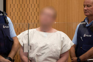 Brenton Tarrant, charged for murder in relation to the mosque attacks, is seen in the dock during his appearance in the Christchurch District Court