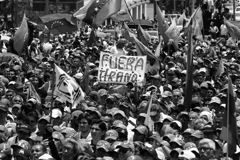 Apoiadores acompanham comício do autoproclamado presidente da Venezuela, Juan Guaidó, em 16 de março