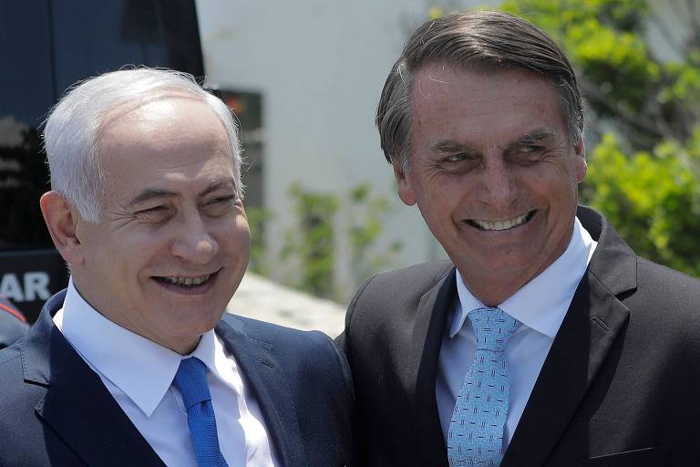 O primeiro-ministro de Israel, Benyamin Netanyahu, e o então presidente eleito do Brasil, Jair Bolsonaro, sorriem para foto