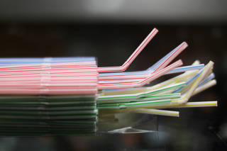FILE PHOTO: Plastic straws are on display in a shop in Nice