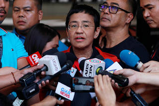 Rappler CEO and Executive Editor Maria Ressa is speaks to the media after posting bail in Pasig Regional Trial Court