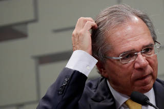 Brazil's Economy Minister Paulo Guedes gestures during a meeting at Economic Affairs Committee (CAE) of the Brazilian Federal Senate in Brasilia