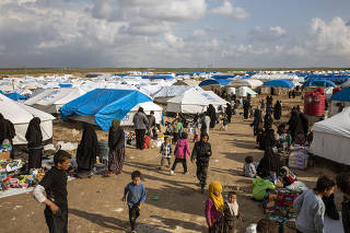 Women and children who fled the Islamic State?s last areas of control in Syria at the Al Hol camp in northern Syria on March 28, 2019.