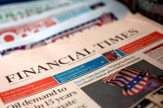 FILE PHOTO: The cover of the Financial Times newspaper is seen with other papers at a news stand in New York