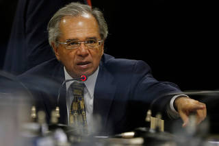 Brazil's Economy Minister Paulo Guedes attends a meeting with Social Liberal Party (PSL) lawmakers in Brasilia