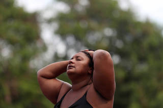 Luciana Nogueira, widow of Evaldo Rosa dos Santos, reacts at the Institute of Forensic Science, after recognizing the body of her husband, who was killed during a military operation in Rio de Janeiro