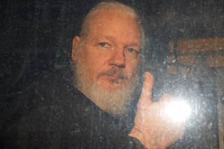 WikiLeaks founder Julian Assange is seen as he leaves a police station in London