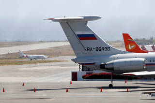 FILE PHOTO: An airplane with the Russian flag is seen at Simon Bolivar International Airport in Caracas