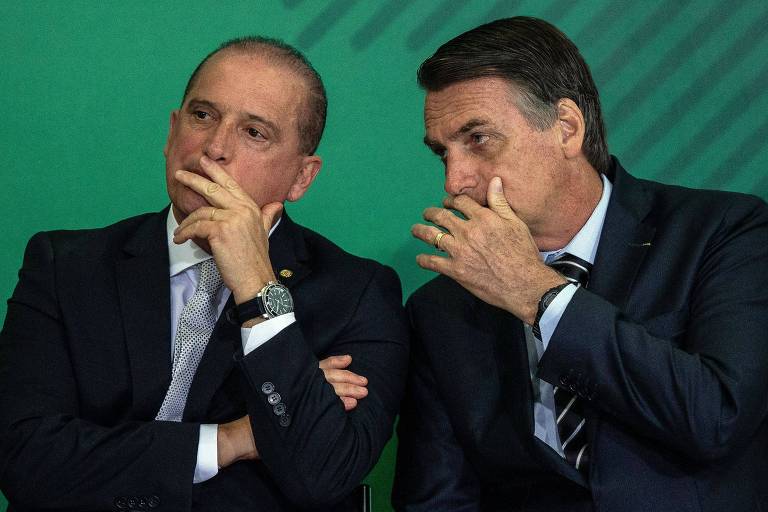 Onyx Lorenzoni e Jair Bolsonaro conversam no Palácio do Planalto, em Brasília 