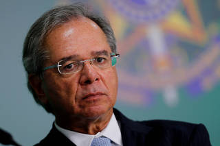 Brazil's Economy Minister Paulo Guedes looks on during a news conference in Brasilia