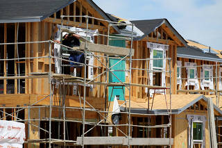 FILE PHOTO: Single family homes being built by KB Homes are shown under construction in San Diego