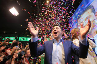 Candidate Zelenskiy reacts following the announcement of an exit poll in Ukraine's presidential election in Kiev