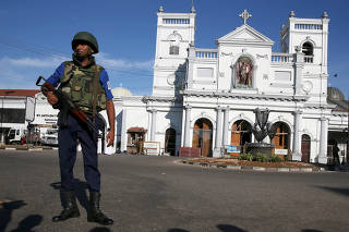 A security officer stands in front of St Anthony's shrine in Colombo