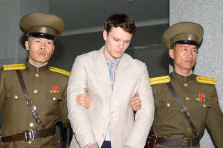 FILE PHOTO - Otto Frederick Warmbier is taken to North Korea's top court in Pyongyang North Korea