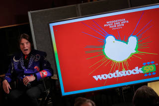 Singer John Fogerty speaks during the announcement event for the lineup for the Woodstock 50th Anniversary concert in New York