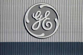FILE PHOTO: The logo of US conglomerate General Electric is pictured at the company's site of its energy branch in Belfort