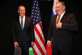 U.S. Secretary of State Mike Pompeo and Russia's Foreign Minister Sergei Lavrov arrive to talk to the press as they meet on the sidelines of the Arctic Council Ministerial Meeting in Rovaniemi