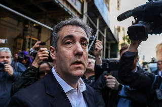 Michael Cohen, a former lawyer for U.S. President Donald Trump leaves his apartment to report to prison in New York