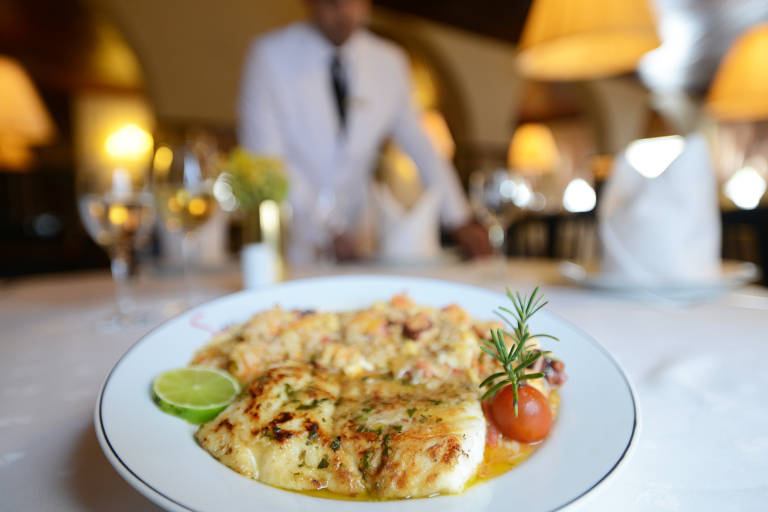 Garopa especial com arroz de frutos do mar do Leite