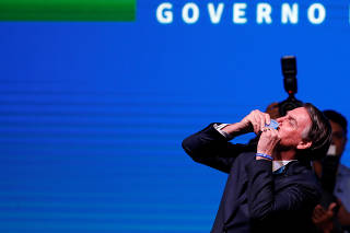 Brazil's President Jair Bolsonaro gestures during the event 