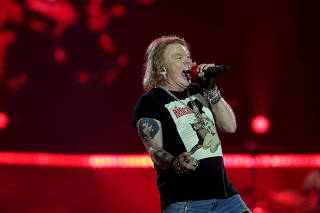 FILE PHOTO: Axl Rose, lead singer of U.S. rock band Guns N' Roses, performs in Abu Dhabi