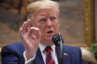 Trump warns China not to retaliate against US trade tariffs