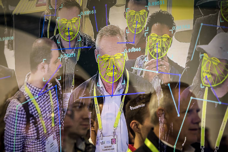 FILE -- Attendees interact with a facial recognition demonstration during the Consumer Electronics Show in Las Vegas, Jan. 8, 2019. The San Francisco board of supervisors has enacted the first ban by a major American city on the use of facial recognition technology by police and other municipal agencies. (Joe Buglewicz/The New York Times)