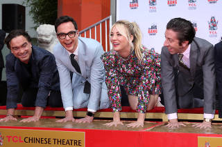 FILE PHOTO: Actors Johnny Galecki, Jim Parsons, Kaley Cuoco and Simon Helberg participate in the cement handprints ceremony for the cast of the television comedy 