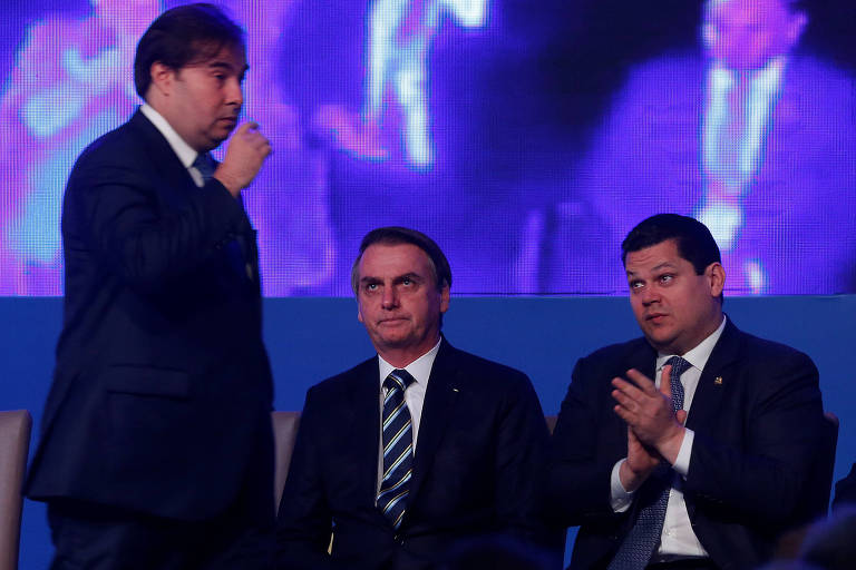 O presidente da Câmara, Rodrigo Maia, o presidente Jair Bolsonaro e o presidente do Senado, Davi Alcolumbre, durante evento em Brasília