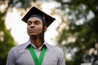 John Cooper, a political science major with $98,000 in student loans, after graduating from Morehouse, a historically black college in Atlanta.