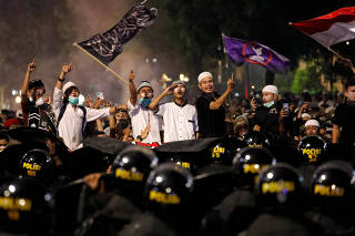 Protest across the Election Supervisory Agency (Bawaslu) headquarters in Jakarta