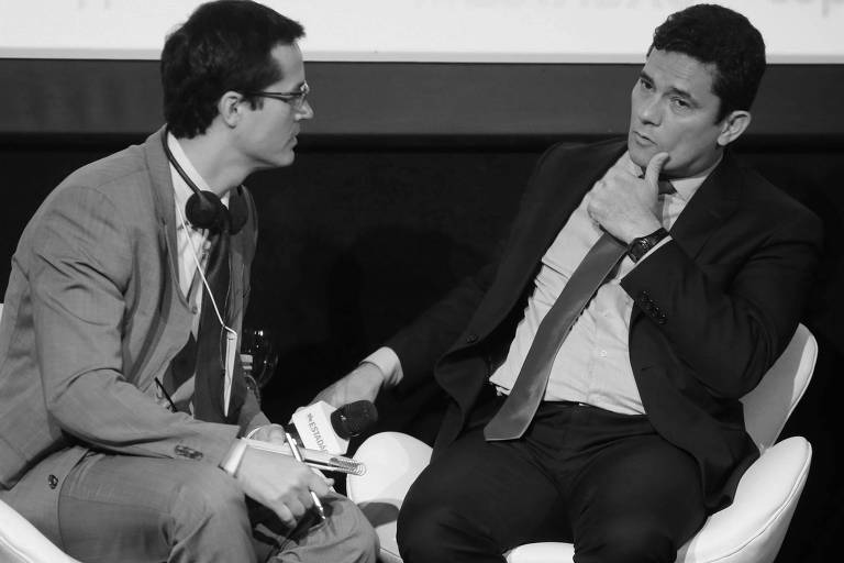 Deltan Dallagnol e Sergio Moro durante participação em fórum em São Paulo, em outubro de 2017

